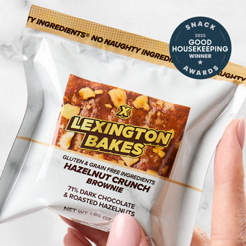 Lexington Bakes Hazelnut Crunch brownie in packaging, held in hand